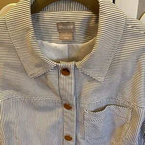 Very cute jacket. Pinstriped navy and white.